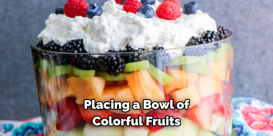 Placing a Bowl of Colorful Fruits